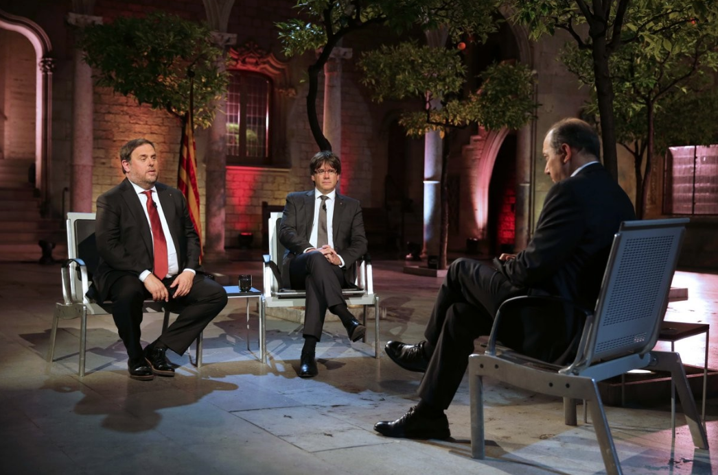 Oriol Junqueras y Carles Puigdemont, durante una entrevista en TV3