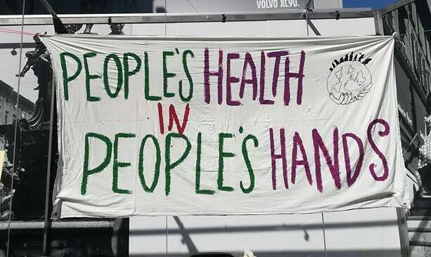 Pancarta en favor de la salud pública