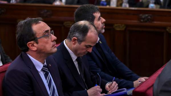 Josep Rull, Jordi Turuill y Jordi Sánchez, durante el juicio del 1-O