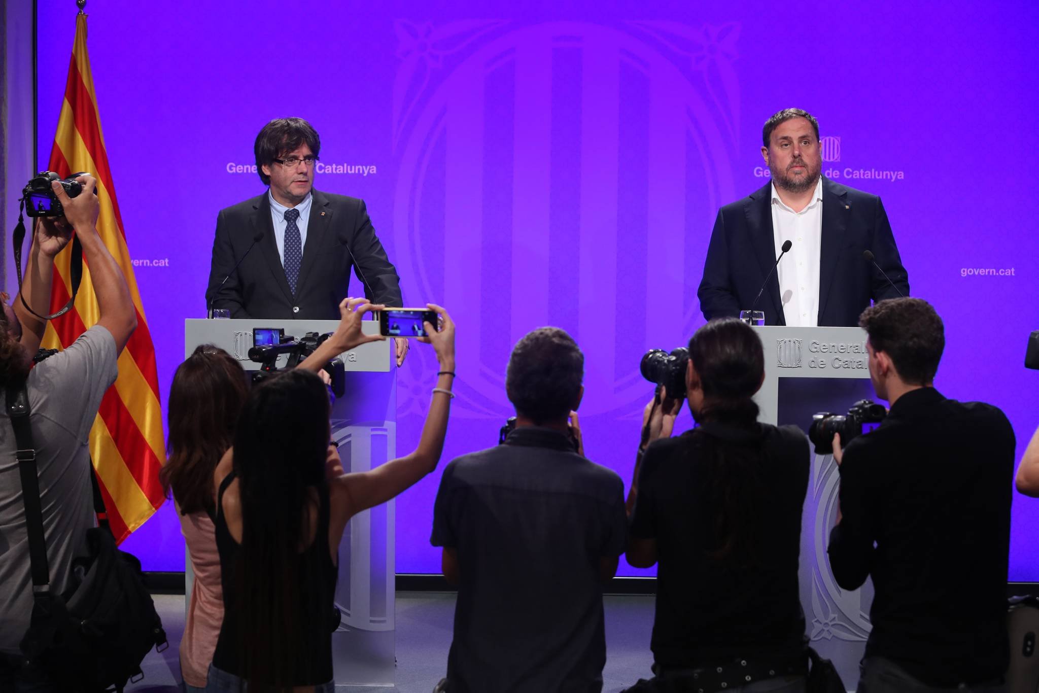 Carles Puigdemont y Oriol Junqueras