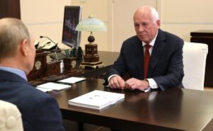 Sergei Chemezov, durant una reunió amb Vladimir Putin