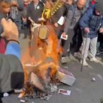 Cremen rèpliques de la Constitució espanyola per protestar contra la reforma del delicte de sedició
