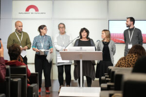 Representants d'entitats LGTBI en roda de premsa al Parlament de Catalunya.